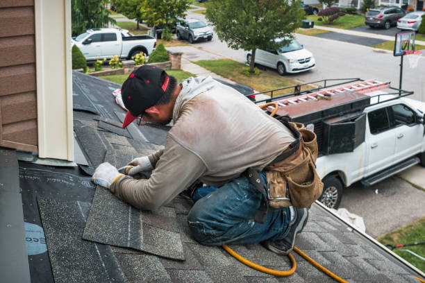 Professional Roof Replacement technician working in Pioneer, OH